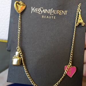 Yves Saint Laurent Gold Bracelet with Pink Heart and Eiffel Tower Charms